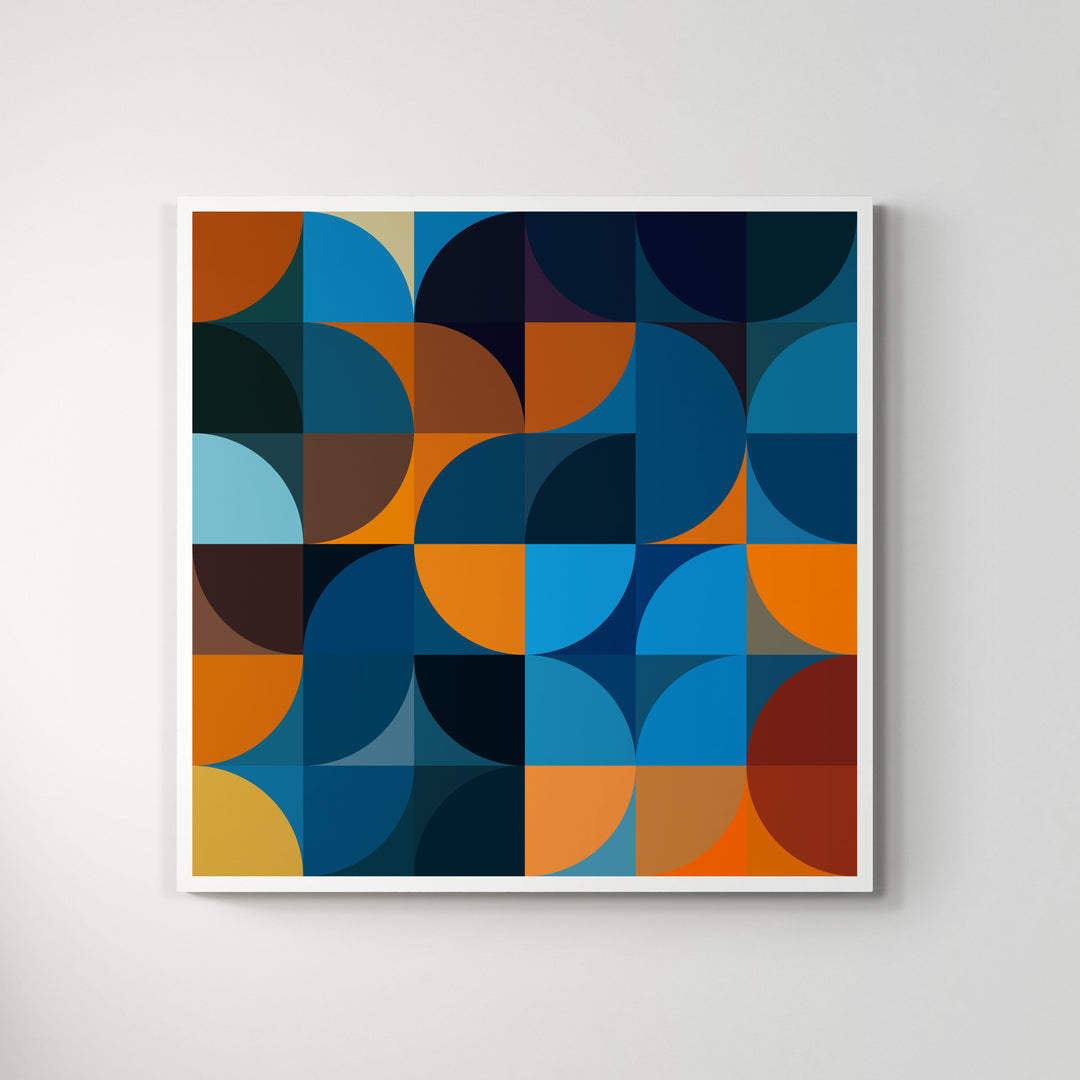 A giclée print of a colorful geometric digtal artwork on a white wall. Abstract floral pattern, mainly blue and orange colors